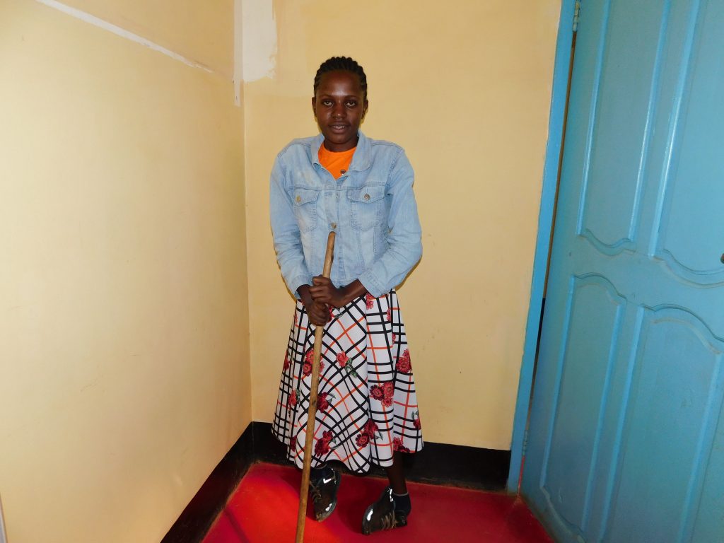 Faith standing after her recovery